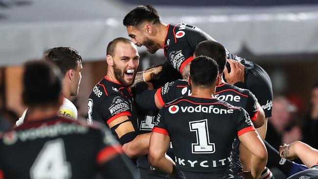 Simon Mannering (left) and Shaun Johnson celebrate at Mt Smart Stadium.