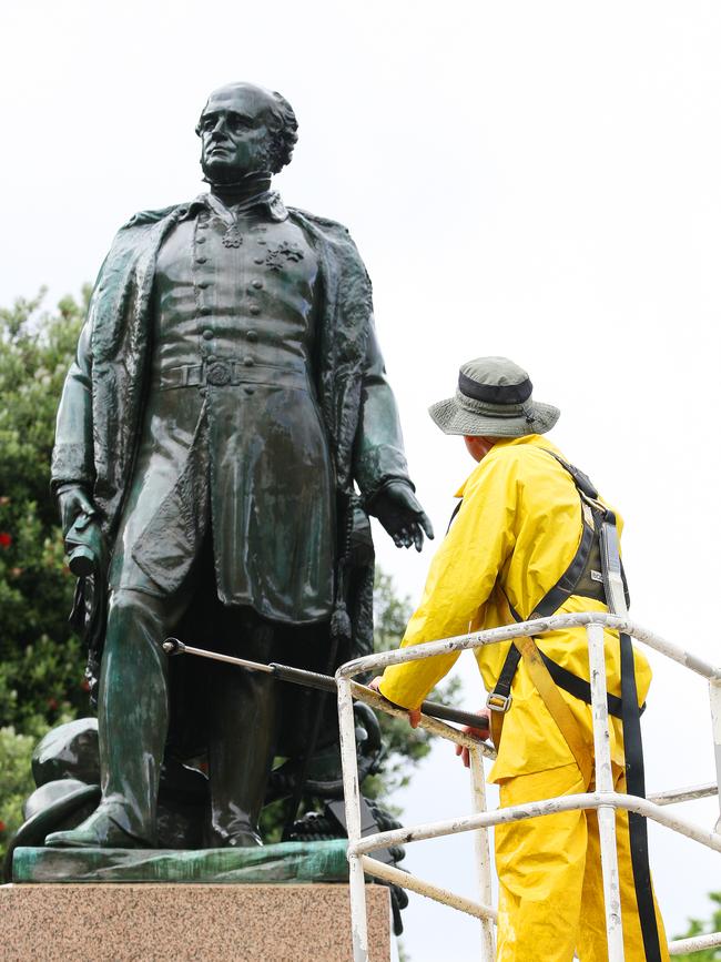 MAINTENANCE: Sir John Franklin gets a hot wax. Picture: RICHARD JUPE