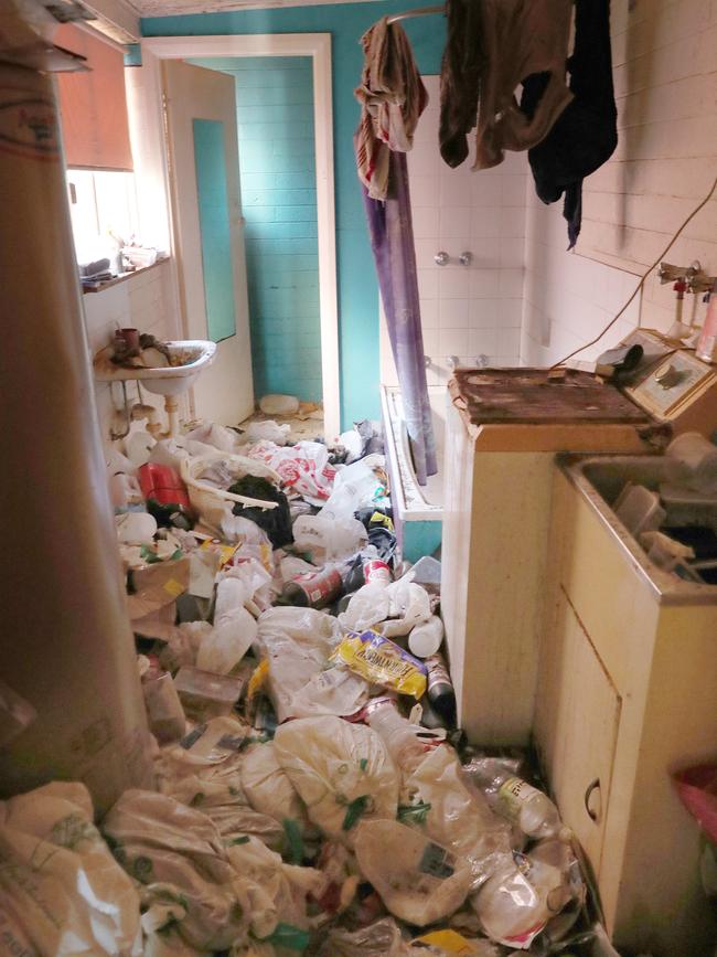 Bathroom and laundry. Rental property in Hobart that has been left with huge amounts of rubbish after the tenant vacated. Picture: Nikki Davis-Jones