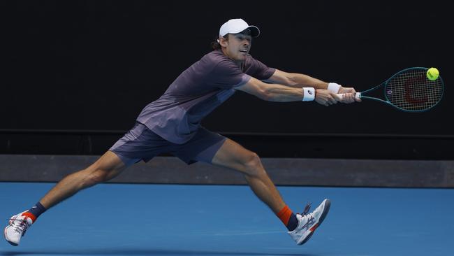 Alex de Minaur practises on Margaret Court Arena on Friday. Picture: Michael Klein