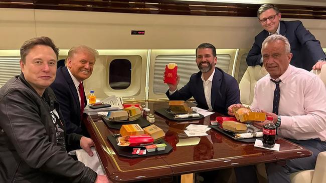 Donald Trump, Donald Jr, RFK Jr, Elon Musk, and Mike Johnson pictured in the background, on their way to the UFC fight. Picture: Margo Martin