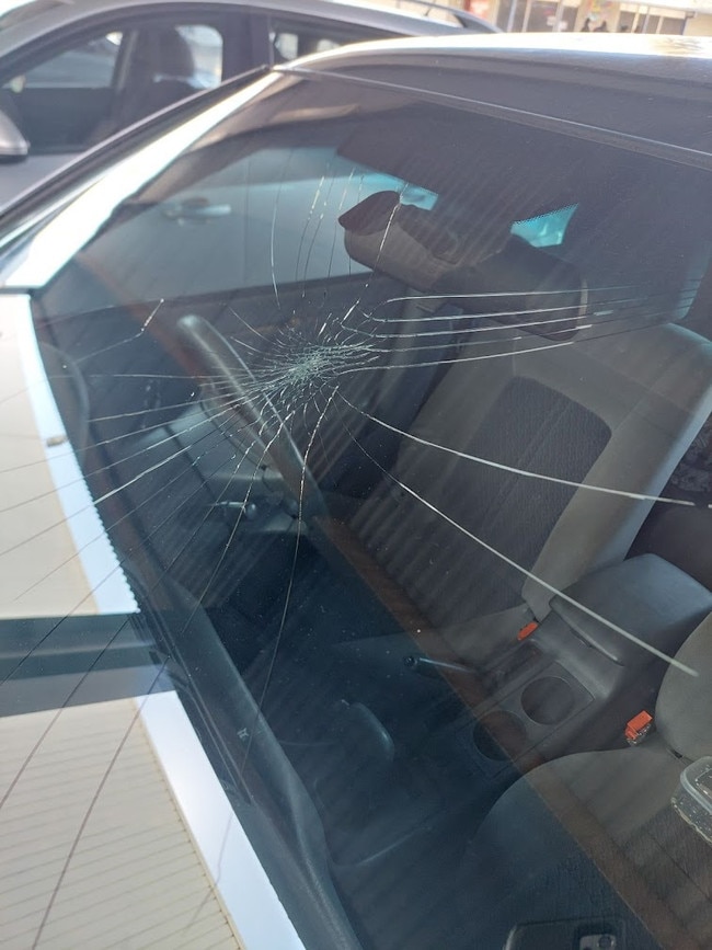 The window of a car was smashed in a brawl in the Alice Springs CBD on Wednesday, July 10.