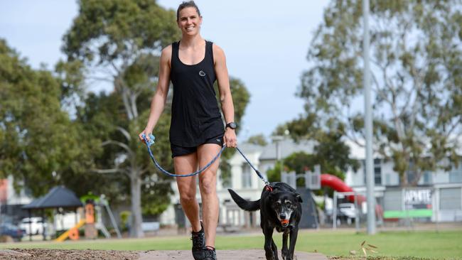 Chelsea Randall with Koda: “I knew if I remained positive it would be a pretty small thing in the wider scheme of life.” Picture: Brenton Edwards