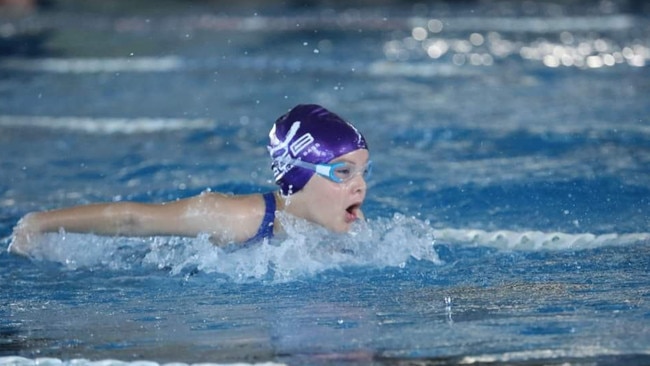 Ten-year-old vision impaired swimmer, Amy Hodson from Wonthaggi, is raising money to help sick kids in hospital.