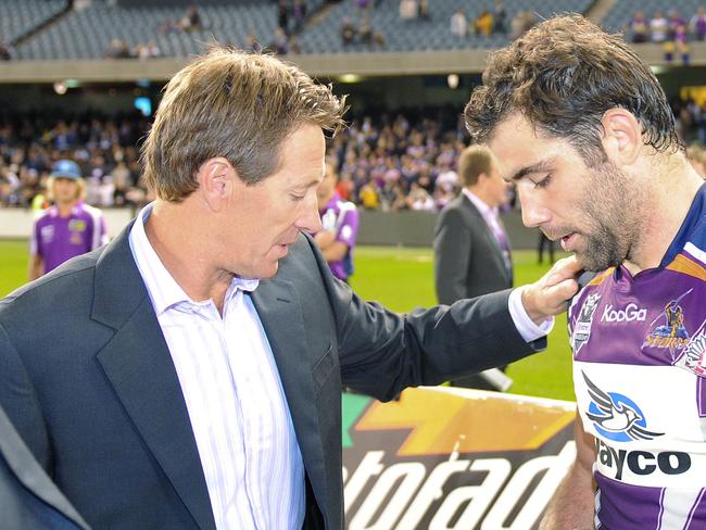 Melbourne Storm NRL team captain Cameron Smith (R) talking with coach Craig Bellamy after they defeated the New Zealand Warriors at AAMI Park in Melbourne, 25/04/2010 in their first match since been found guilty of breaching the salary cap in a fraud which has rocked Australian sport.