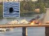 Woman leaps into river from burning train
