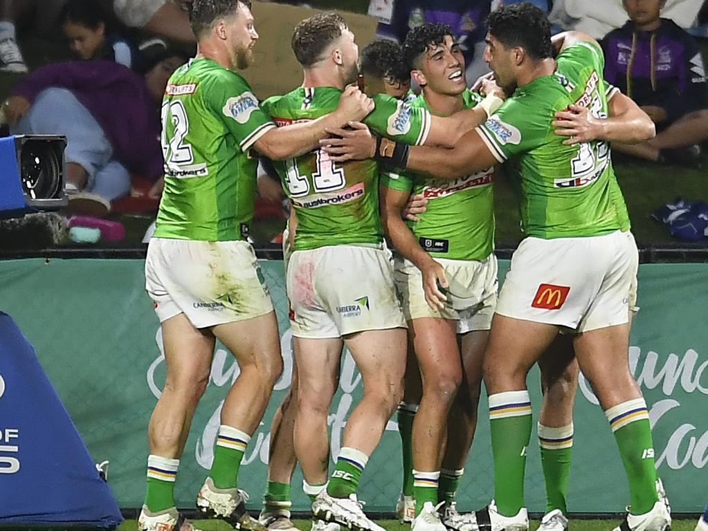 SUNSHINE COAST, AUSTRALIA – AUGUST 12: Bailey Simonsson of the Raiders celebrates with teammates after scoring a try during the round 22 NRL match between the Melbourne Storm and the Canberra Raiders at Sunshine Coast Stadium, on August 12, 2021, in Sunshine Coast, Australia. (Photo by Albert Perez/Getty Images)