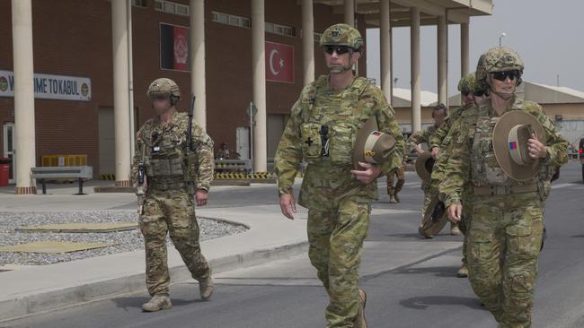 ADF chief General Angus Campbell met with Australian Defence Force and coalition personnel during an official visit to Camp Baird in the Middle East region in 2016.