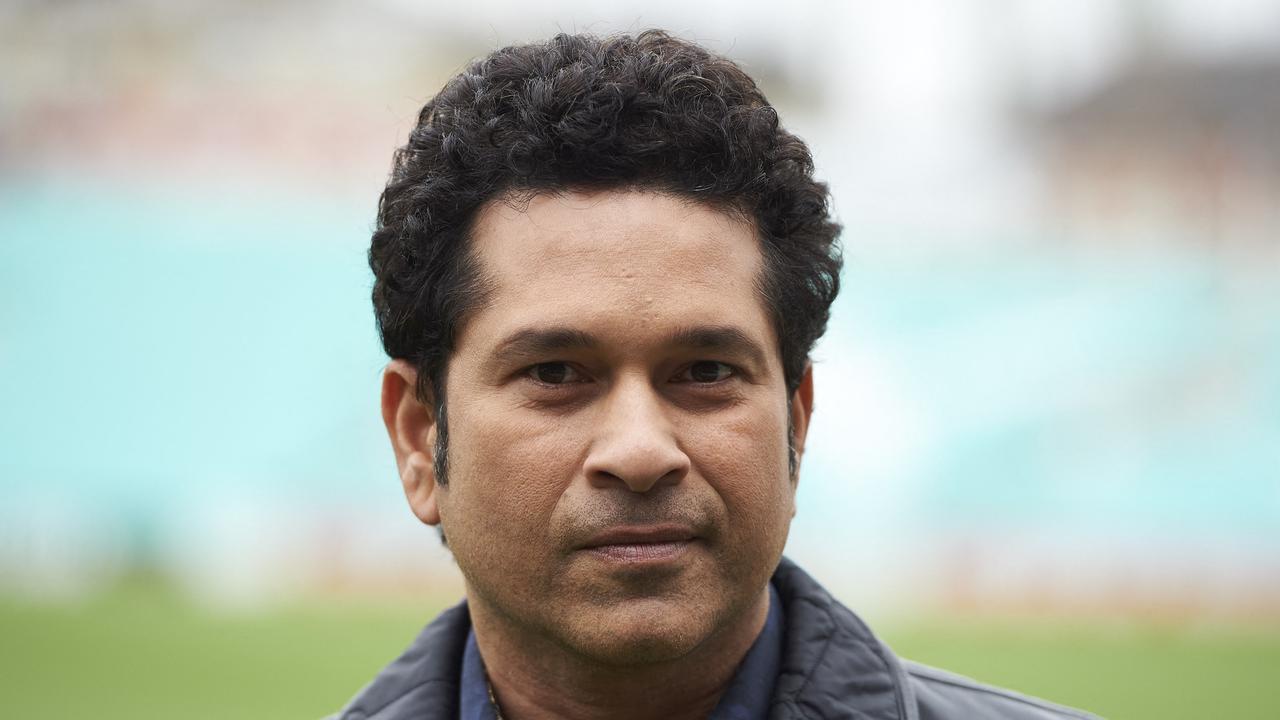 Indian cricket legend Sachin Teldulkar poses for a photograph during a photocall at the Oval