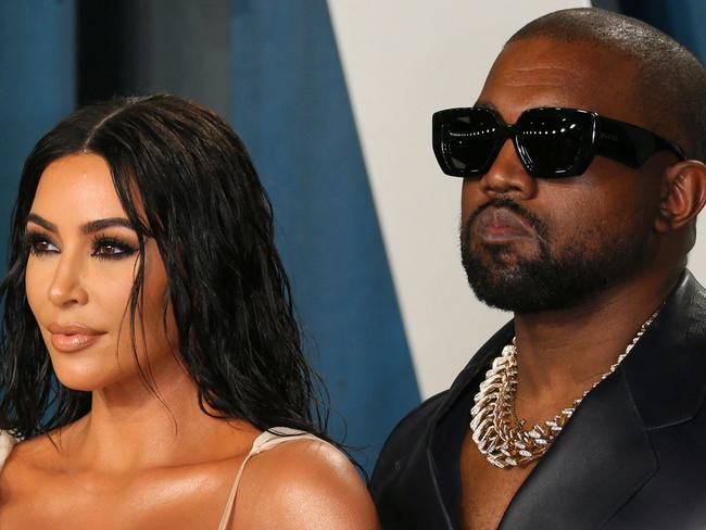 (FILES) In this file photo US media personality Kim Kardashian (L) and husband US rapper Kanye West attend the 2020 Vanity Fair Oscar Party following the 92nd Oscars at The Wallis Annenberg Center for the Performing Arts in Beverly Hills on February 9, 2020. - Reality TV star Kim Kardashian has filed for divorce from rapper Kanye West after almost seven years of marriage, US media reported February 19.   Kardashian's lawyer Laura Wasser filed papers confirming a split first rumored back in January, when the mega-celebrity couple were reported to be living separately, Fox News said. (Photo by Jean-Baptiste Lacroix / AFP)