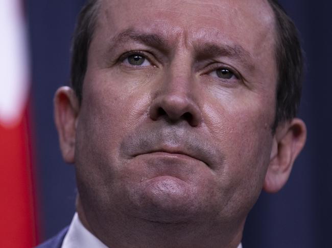 PERTH, AUSTRALIA - JUNE 29: West Australian Premier Mark McGowan speaks to media at Dumas House on June 29, 2021 in Perth, Australia. Lockdown restrictions have come into effect across the Perth and Peel regions for the next four days, following the confirmation of new community COVID-19 cases linked to the highly contagious Delta variant of the coronavirus. From midnight, residents in the Perth and Peel regions are only permitted to leave their homes for essential reasons, including purchasing essential goods, receiving medical care, or caring for the vulnerable. People may leave home to get vaccinated or to exercise within a 5-kilometre radius of their home. Weddings are restricted to five people, funerals to 10 people while gyms, beauty and hair salons, casinos and nightclubs must close. (Photo by Matt Jelonek/Getty Images)