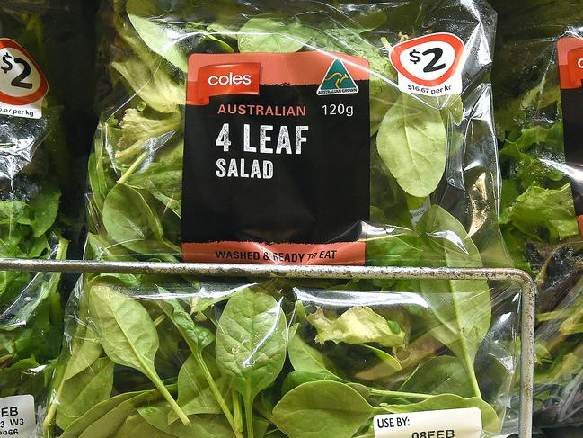 Bags of recalled Pre-packed Four Leaf lettuce remain on sale at a Coles store on the Gold Coast, Friday, Feb.5, 2016. 28 cases of salmonella anatum strain have been reported, linked to pre-packed lettuce distributed nationally by Victorian-based company, Tripod Farmers. (AAP Image/Dave Hunt) NO ARCHIVING