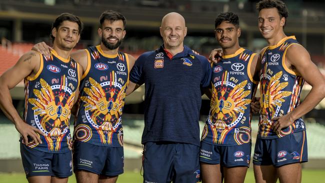 Crows indigenous players LR. Shane McAdam, Wayne Milera, Matthew Nicks (coach), Tariek Newchurch, Ben Davis pictured ahead of their clash against St Kilda at Adelaide Oval last May. Picture: Roy VanDerVegt