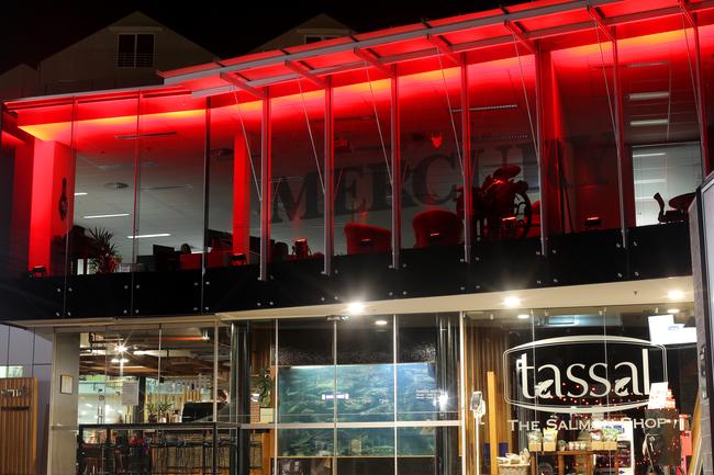 The Mercury office lit up red for Dark Mofo. Picture: LUKE BOWDEN