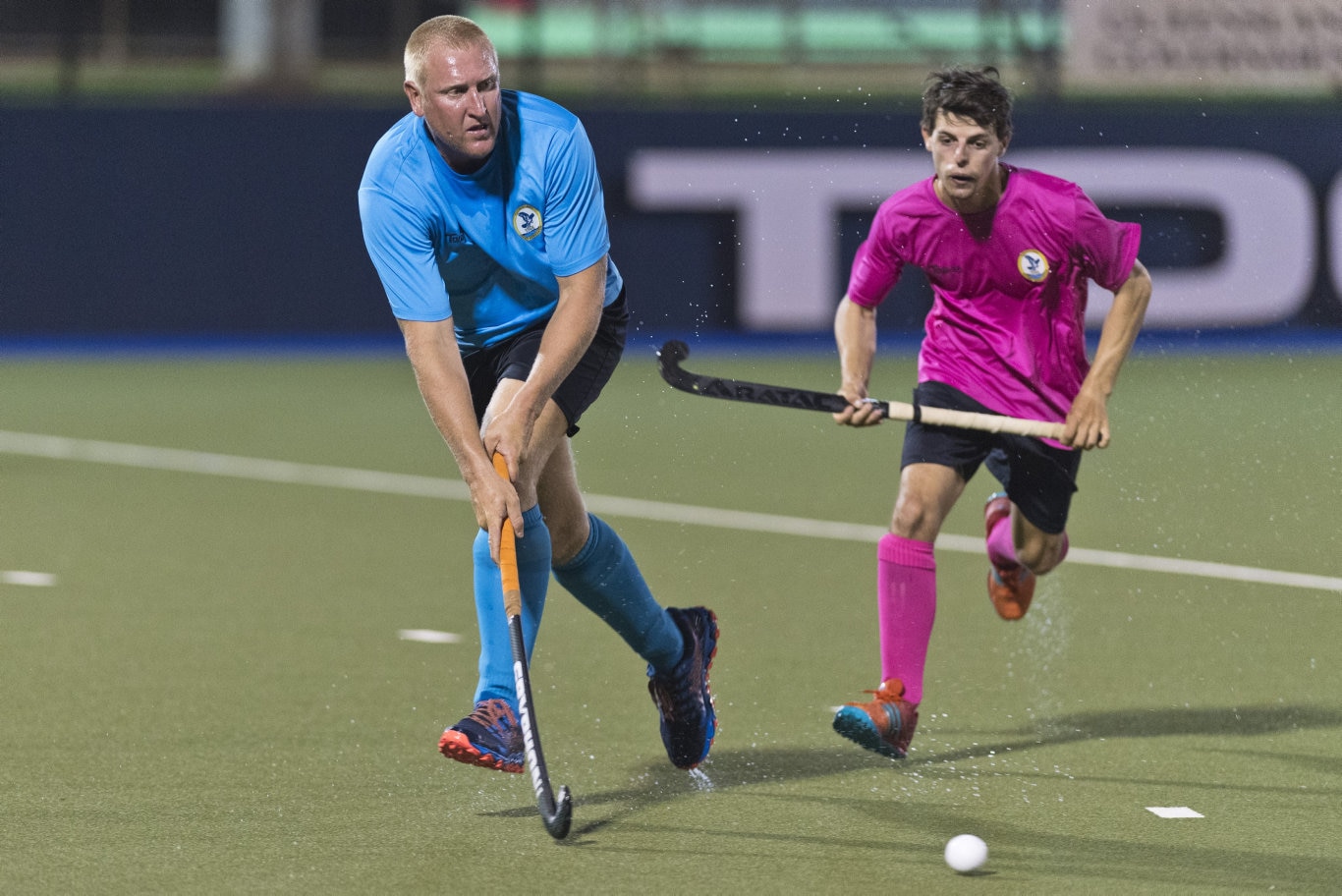 Matthew Siebuhr (left) of SQPS Scorers and Josh McPaul of Pink Batts in Iron Jack Challenge mens hockey at Clyde Park, Friday, February 28, 2020. Picture: Kevin Farmer