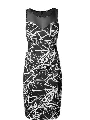 Monochrome is far from dull, with this print outfit. MRP black and white dress, $13.60, mrp.com.