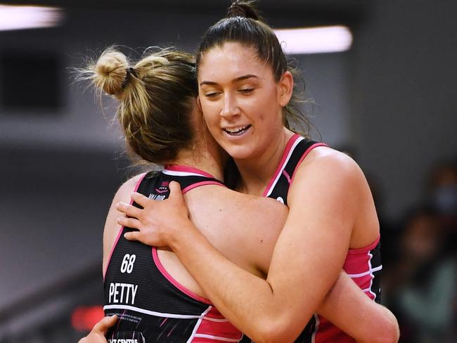 ADELAIDE, AUSTRALIA - JULY 04: Hannah Petty of the Thunderbirds and Matilda Garrett of the Thunderbirds hug and celebrates the win during the round nine Super Netball match between Adelaide Thunderbirds and Collingwood Magpies at Netball SA Stadium, on July 04, 2021, in Adelaide, Australia. (Photo by Mark Brake/Getty Images)