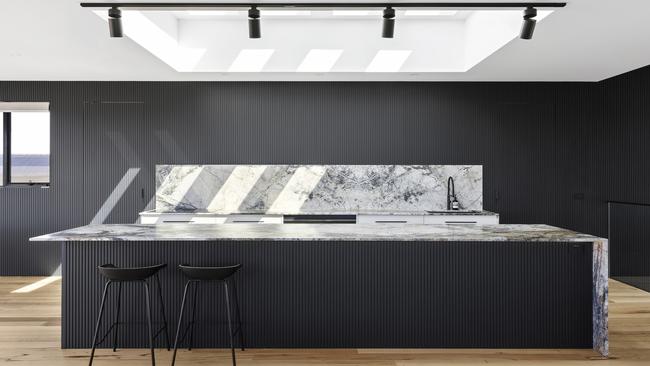 Surround by Laminex cladding creates a streamlined look in the kitchen.