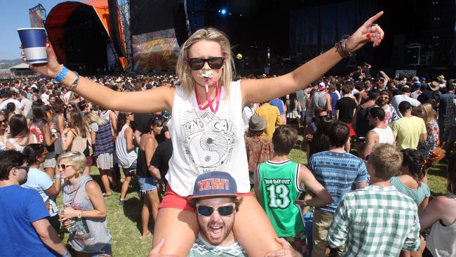 Adelaide Big Day Out music festival at Wayville Showgrounds - (l-r) music fans Mieke Hyland on Adam Lyons.