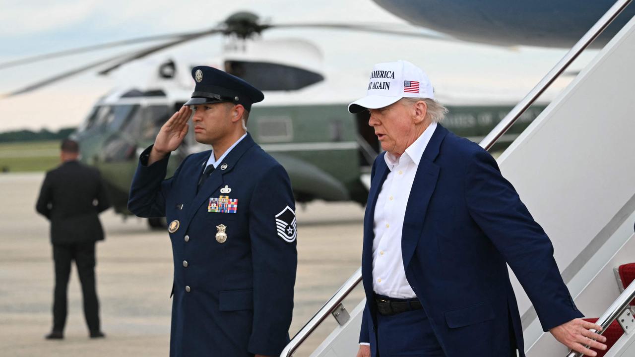 US President Donald Trump disembarks from Air Force One upon arrival at Joint Base Andrews in Maryland. Picture: AFP