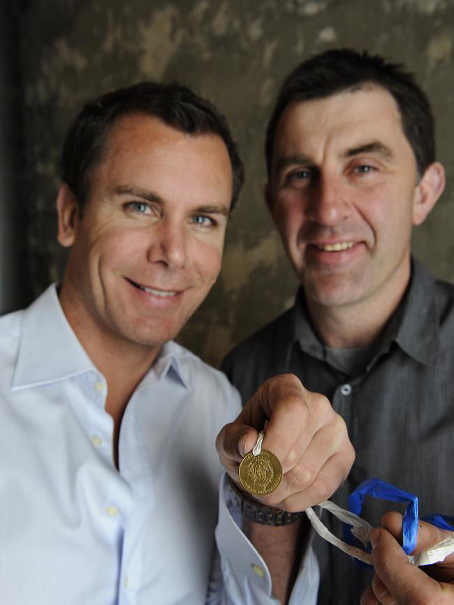 McKernan and Wayne Carey with the fake Brownlow Medal.