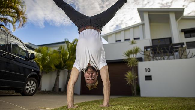 ‘We will bounce back’: one of the company’s Australian trampoline artists, Fletcher Donohue, 24, outside his home on the Gold Coast. Picture: Glenn Hunt