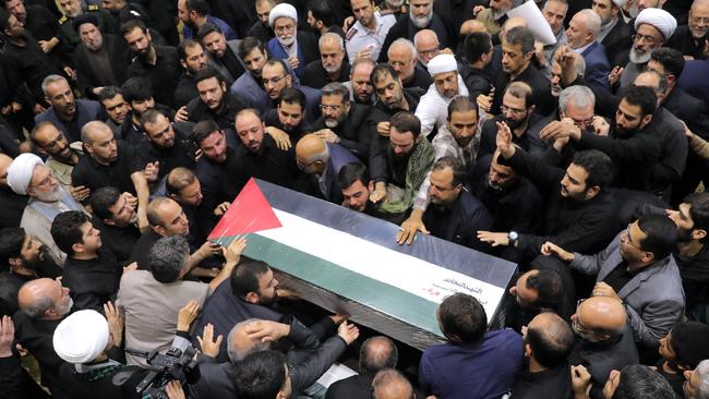 People gather during a funeral procession for Ismail Haniyeh, in Tehran, beforehis bodies was returned to Qatar for an official funeral and burial. Picture; Office of the Iranian Supreme Leader/Getty Images