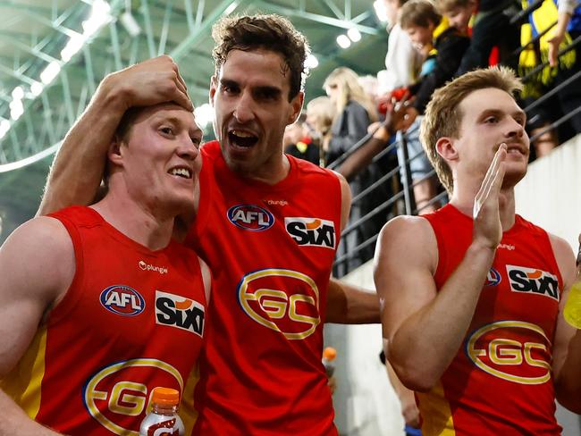 MELBOURNE, AUSTRALIA - APRIL 30: Matt Rowell, Ben King and Noah Anderson of the Suns leave the field during the 2023 AFL Round 07 match between the Richmond Tigers and the Gold Coast Suns at Marvel Stadium on April 30, 2023 in Melbourne, Australia. (Photo by Dylan Burns/AFL Photos via Getty Images)