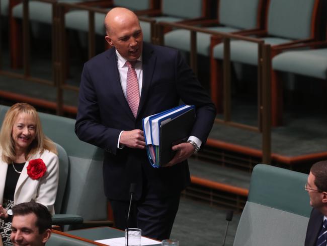 Backbenchers welcome Mr Dutton to his new place on the backbench. Picture: Kym Smith