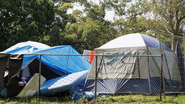 Tents in a fenced off area at Musgrave Park in South Brisbane which has seen an escalation of fighting and unsociable behaviour according to council complaints.