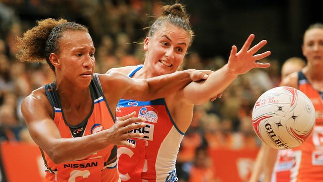 Serena Guthrie of the Giants competes for the ball with Maddy Proud of the Swifts. Picture: Mark Evans
