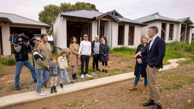 Premier Peter Malinauskas with Felmeri customers outside their unfinished O’Halloran Hill houses. Picture: Ben Clark