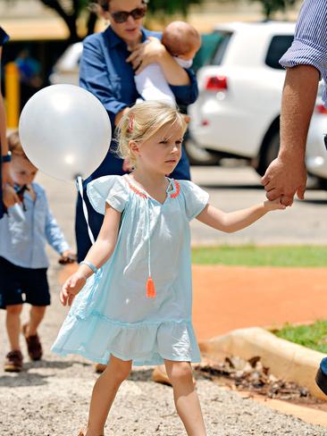 Family and friends depart Casuarina Street primary school after Dolly Everett's memorial service in Katherine, Northern Territory.