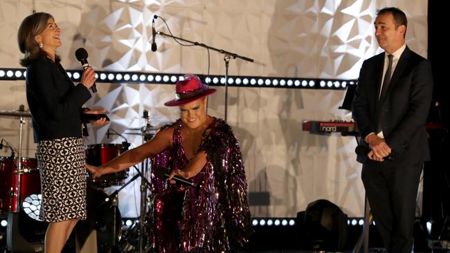 Chief Public Health Officer Professor Nicola Spurrier is worshipped by Hans with Premier Steven Marshall at a performance for Pullman Hotel guests. Picture: Kelly Barnes/Getty Images