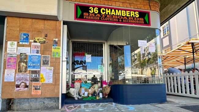 Tributes to Mr Watson piling up outside his shop.