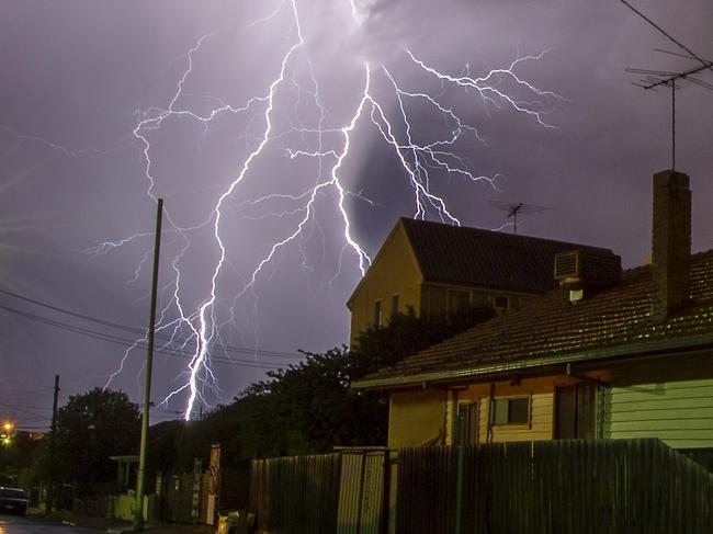 Storms lash Melbourne in the early hours of monday morning with heavy rains, lightening and wind. Images taken in Coburg. Picture: Jason Edwards