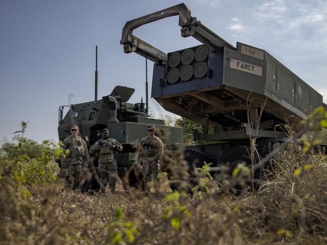 US troops stand next to a High Mobility Artillery Rocket System (HIMARS) during live fire exercises as part of US-Philippines army-to-army joint drills. Picture: Getty Images