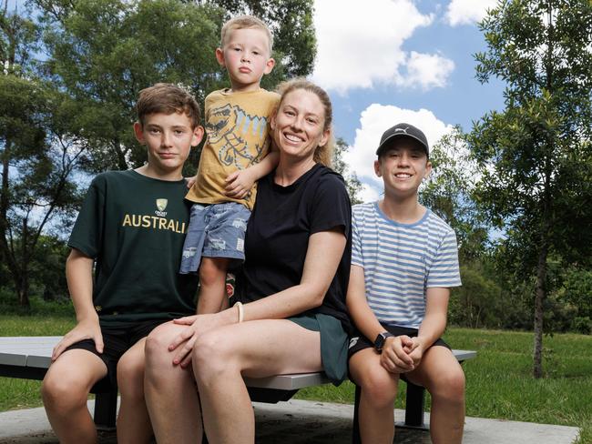 Karinya St Clair with sons Lawson, 3, and twins George and Fraser, 12. Picture: Lachie Millard