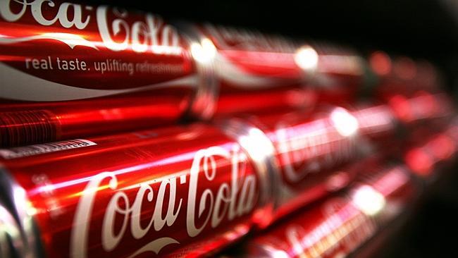 20/11/2008 BUSINESS: Rows of Coca-Cola soft drink line a supermarket shelf in Sydney, Australia, on Monday, Nov. 17, 2008. Li...