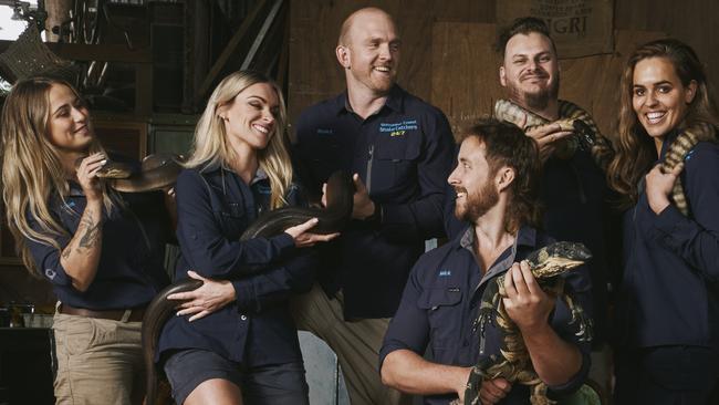 Stuart McKenzie (centre) and the Aussie Snake Wranglers team.