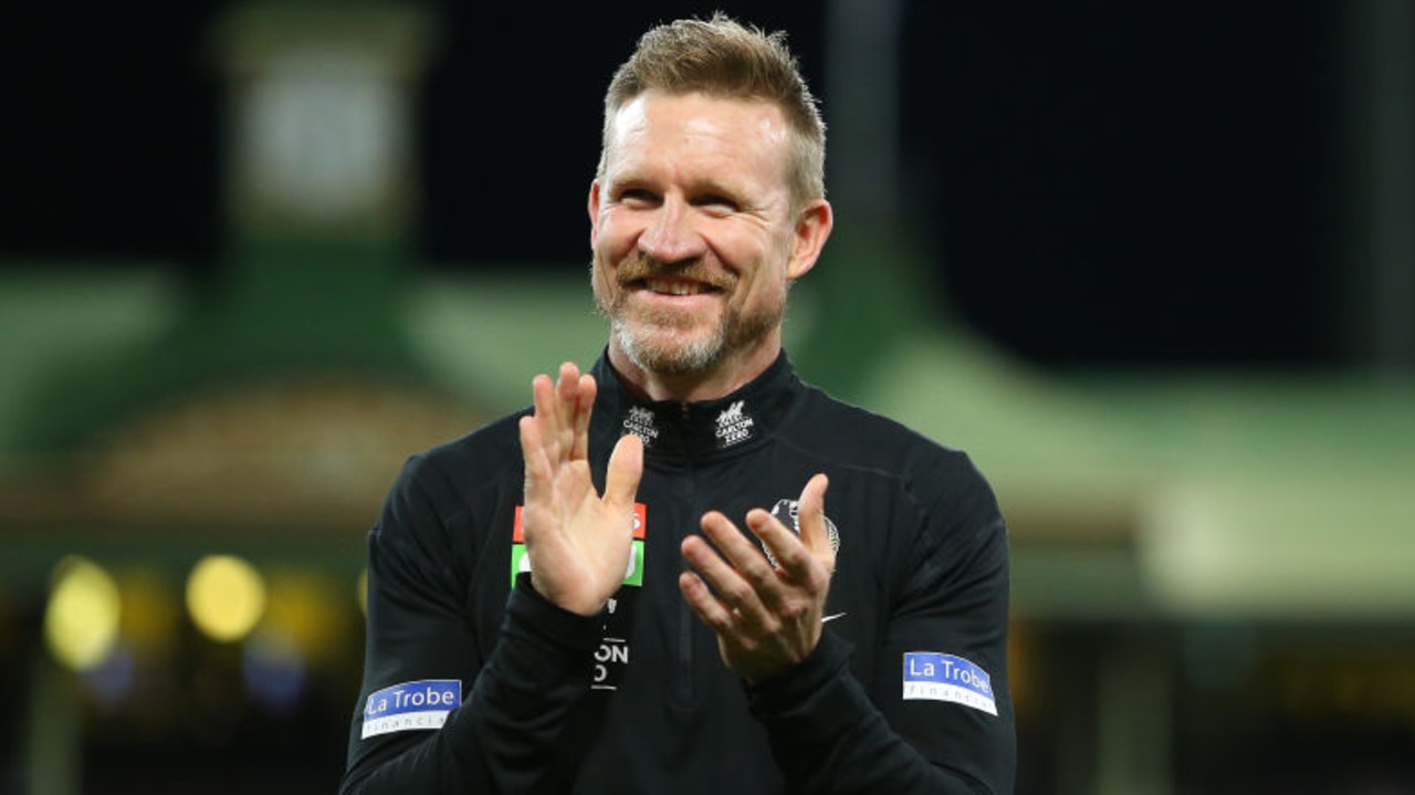 SYDNEY, AUSTRALIA - JUNE 14: Nathan Buckley, Senior Coach of the Magpies celebrates victory during the round 13 AFL match between the Melbourne Demons and the Collingwood Magpies at Sydney Cricket Ground on June 14, 2021 in Sydney, Australia. (Photo by Jason McCawley/AFL Photos/via Getty Images)