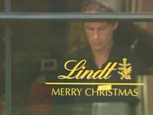 Lindt cafe siege victim Tori Johnson at the window of the Cafe. Picture Channel 7