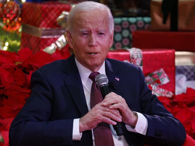 US President Joe Biden speaks during a holiday visit to patients and families at Childrenâs National Hospital in Washington, DC, on December 20, 2024. (Photo by Ting Shen / AFP)