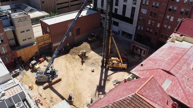 Time-lapse of demolition and early construction of the Realm Adelaide apartments