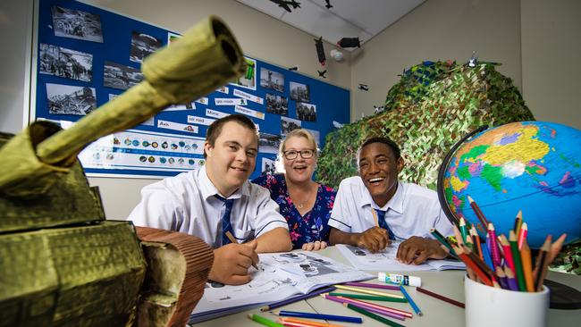 Special education teacher Catherine ‘Tassy’ Engel at Southport State High School with students Toby McGlashan (left) and Natnael Cusack. Picture: Nigel Hallett