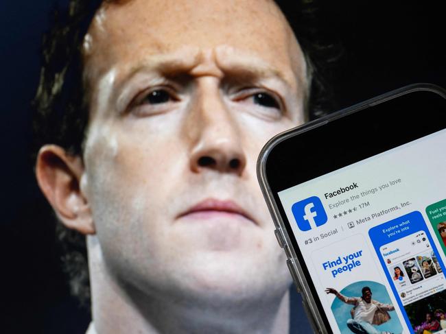 This photo illustration created on January 7, 2025, in Washington, DC, shows an image of Mark Zuckerberg, CEO of Meta, and a phone displaying the download page for the Facebook app. Social media giant Meta on January 7, 2025, slashed its content moderation policies, including ending its US fact-checking program, in a major shift that conforms with the priorities of incoming president Donald Trump. (Photo by Drew ANGERER / AFP)