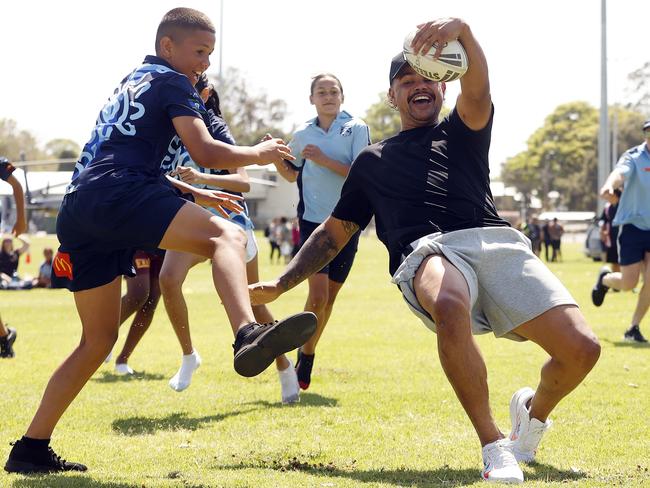 Latrell Mitchell is king of the kids in Kempsey last year, challenging them to a game of touch footy. Picture: Sam Ruttyn