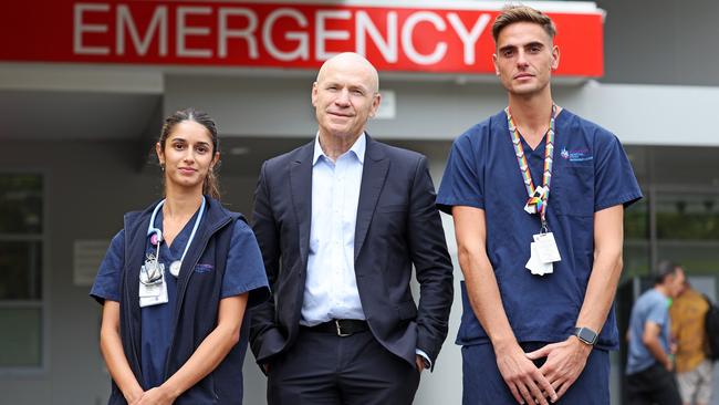 Associate Professor Paul Preisz with nurses Zenaida Dorabjee and Darren Scott are on the frontline of the battle at St Vincent’s Hospital. Picture: Tim Hunter