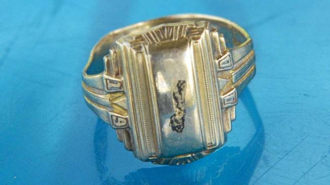 Mark Spencer of CQ Detectorists is seeking the owner of this college ring. Picture: Jann Houley