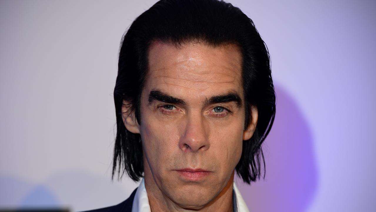 Singer Nick Cave has been used by scammers to trick unsuspecting Aussies. Picture: AFP / Carl Court